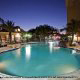 Night Pool View at Hilton Garden Inn in Orlando, Florida. Take a refreshing splash in the cool waters during your Spring Break Family Getaway.