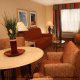 Living Room View at Hilton Garden Inn Orlando at SeaWorld in Orlando, Florida. Everything is taken care of while on your Family Spring Break Vacation.