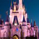 The night lights on the castle in Disneys Magic Kingdom Vacation in Orlando Florida.