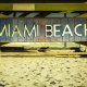 Miami Beach sign on wood background, Florida