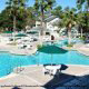 Lagoon Style Pools and Whirlpool Spa at Oak Plantation Resort in Orlando, Florida. Affordable vacation packages now available at Rooms101.com. 