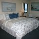 Ocean Trillium Suites king bed