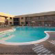 Outdoor Pool for the hotel guests at the Quality Inn Hotel in Biloxi, Mississippi. Refresh yourself in the cool waters during your Family Summer Vacation.