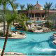 Tropical Swimming Pavilion View with Water slide, Lazy River and Zero-Entry Pool at Regal Palms Resort & Spa in Orlando, Florida (just minutes away from all the major attractions). Cheap Vacation Packages now available at Rooms101.com.