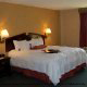 King Size Bed Hotel Room at Hampton Inn Historic District in St. Augustine, Florida.