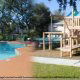 Outdoor playground and pool area at The Florida Vacation Villas.