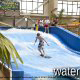 Surfing at the wave pool in the water park at the Wilderness Stone Hill Lodge in Pigeon Forge Tennessee.